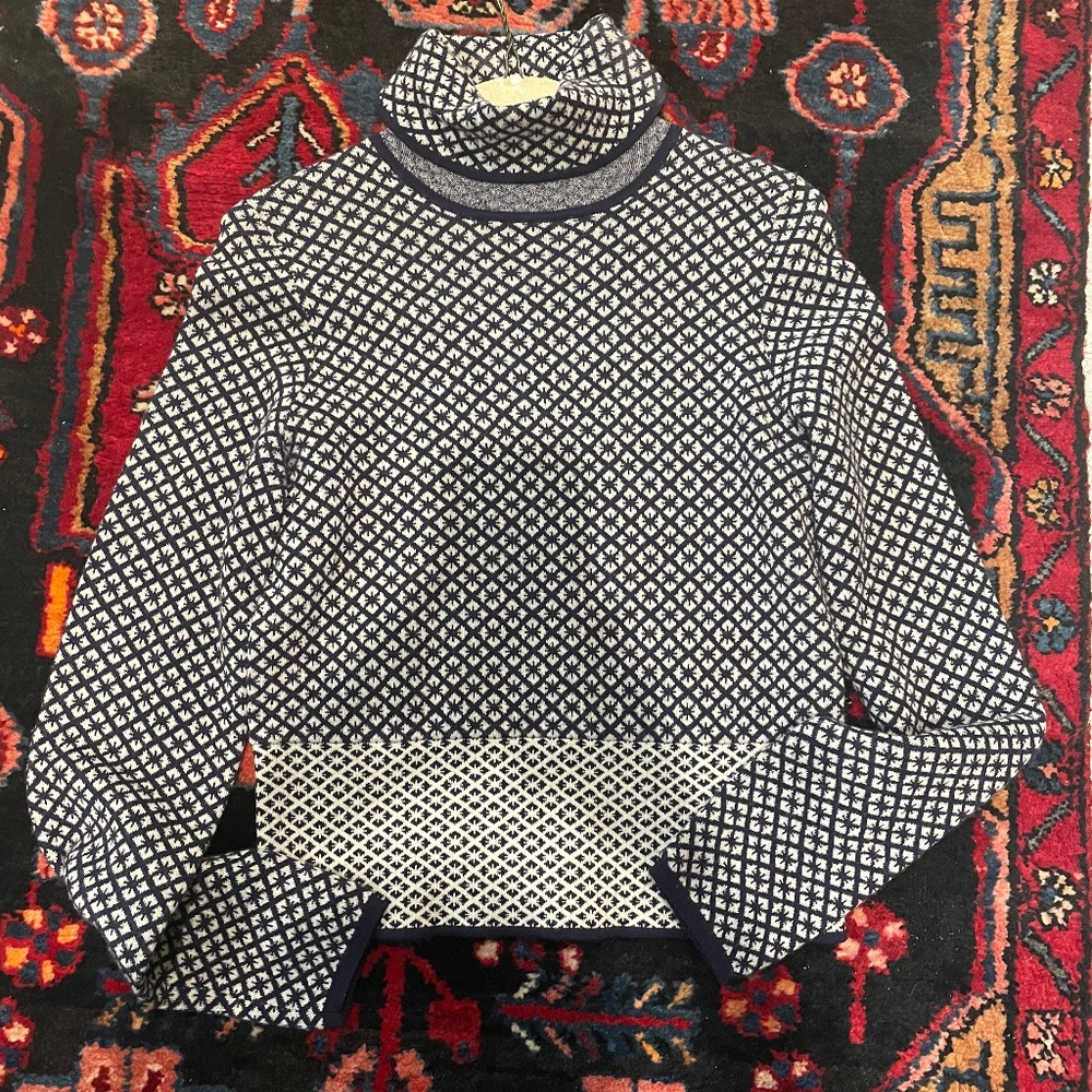 Wool turtleneck with tiny snowflake detail